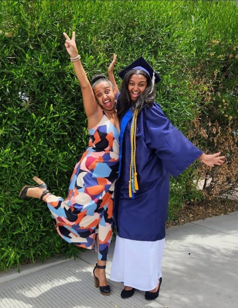 Graduate-standing-with-friend